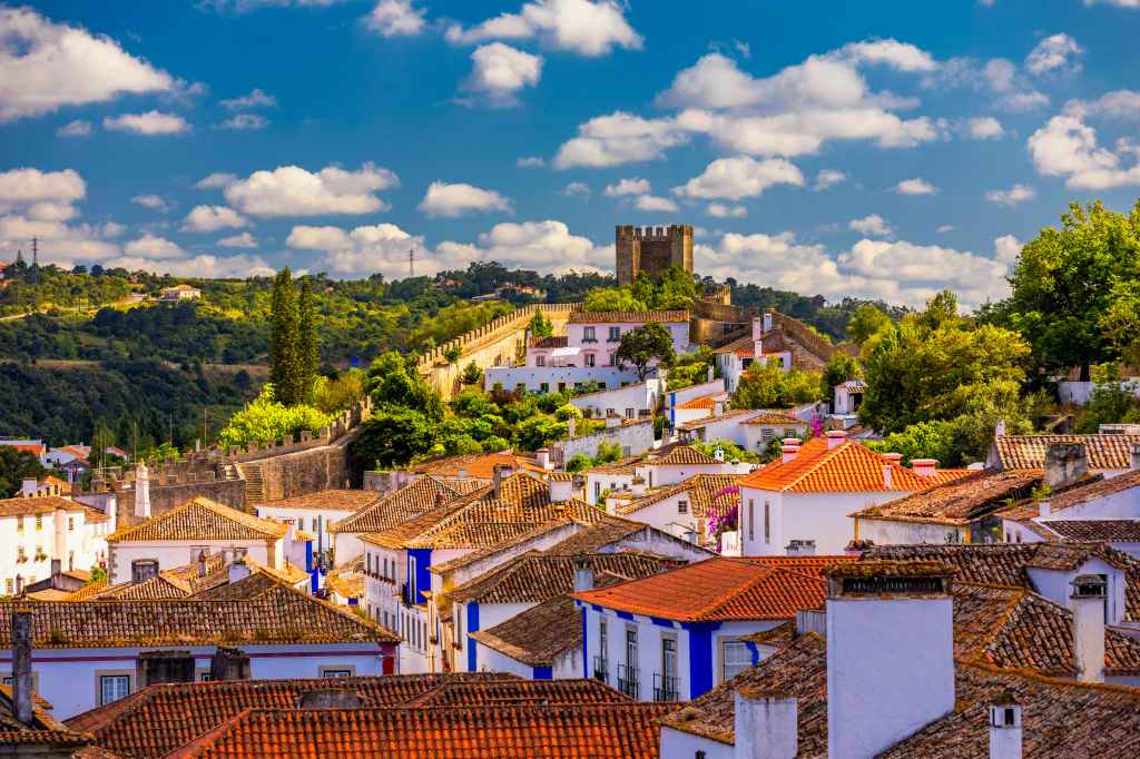 Obidos,,Portugal,Stonewalled,City,With,Medieval,Fortress,,Historic,Walled,Town