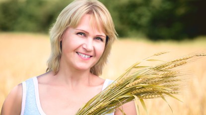 portrait of a woman in a wheat field
