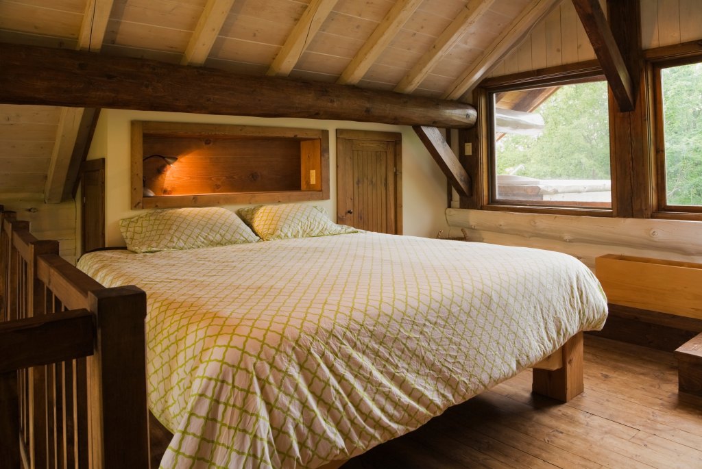King,Size,Bed,On,Wooden,Frame,In,Master,Bedroom,On