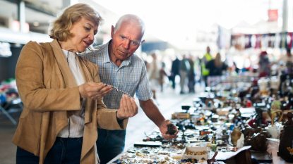 senior woman and man at flea market