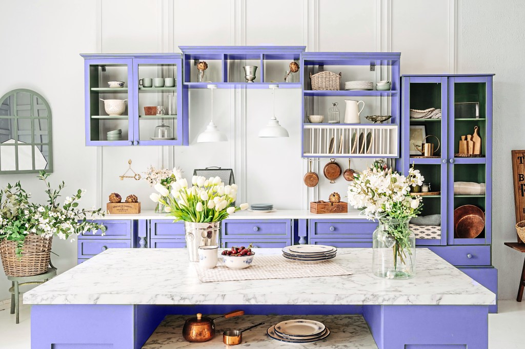 Kitchen with cabinets painted periwinkle