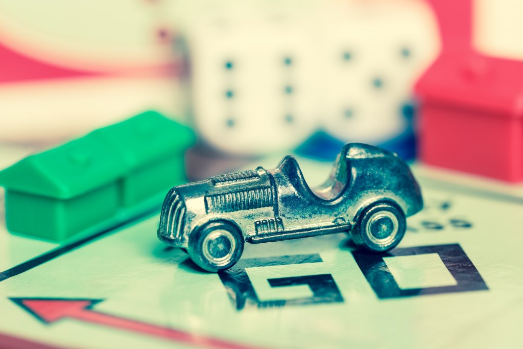 London,uk,-,April,1,2015,:,Car,Token,And,Dice,On