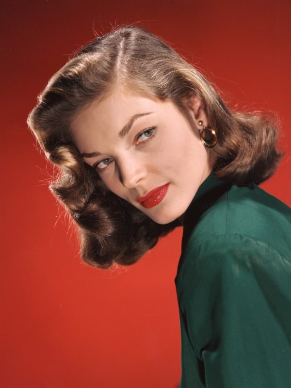 Bacall's pin curls look good from any angle (1945)