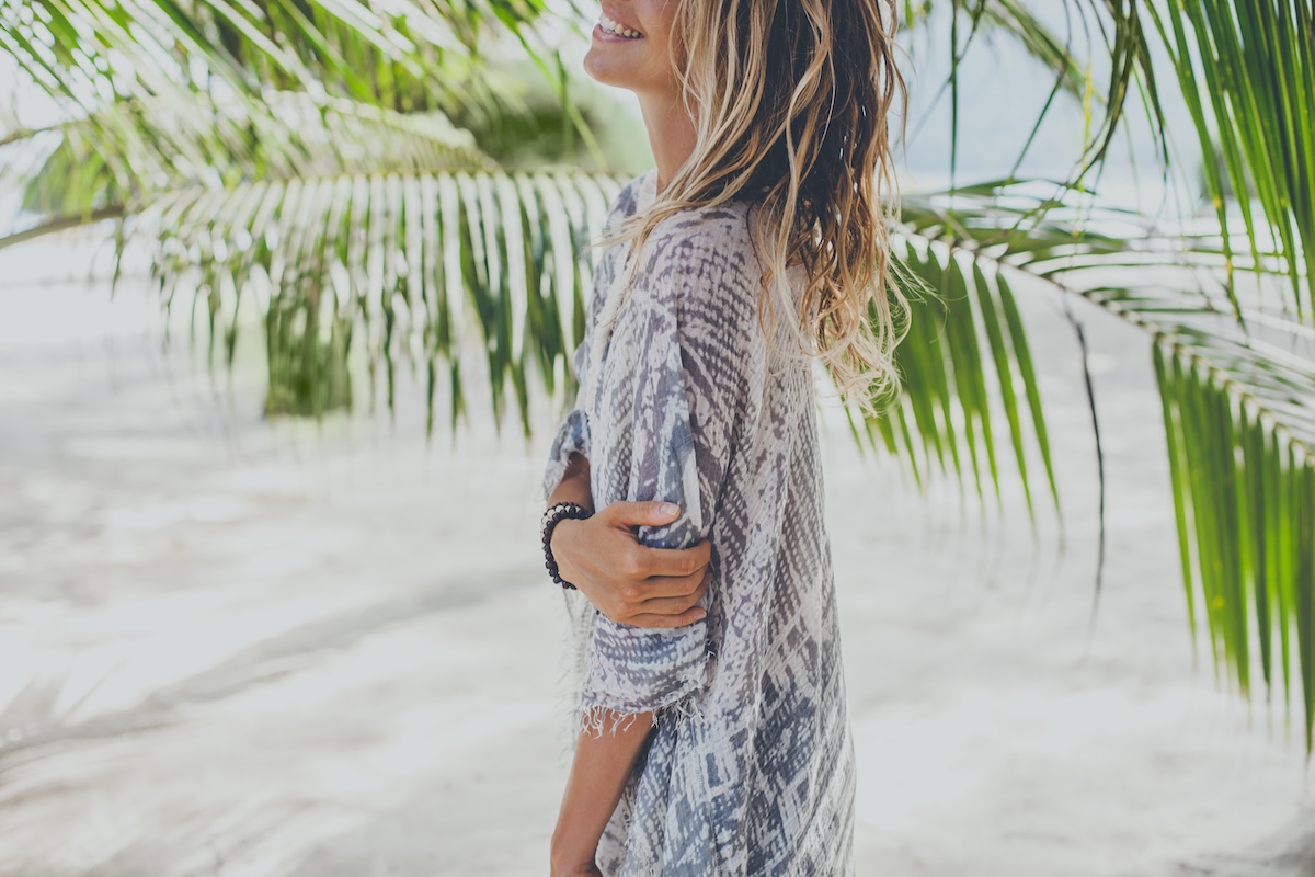 Dreamy girl on beach