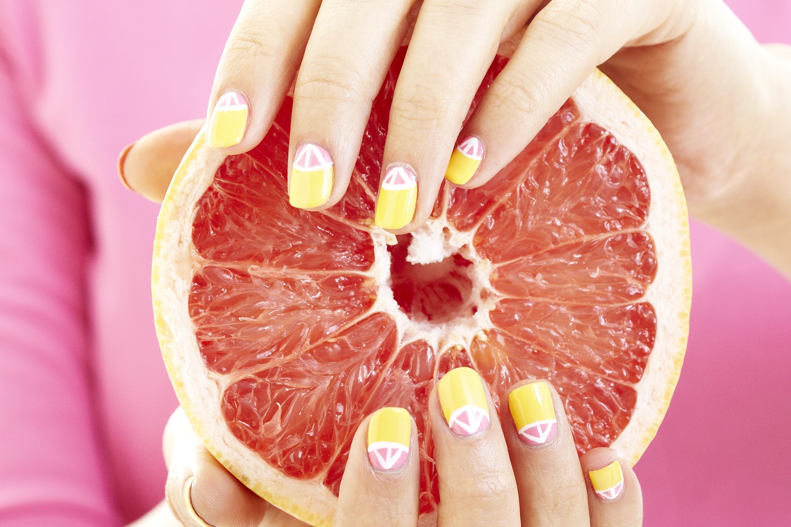Pink grapefruit nail design