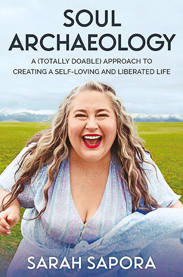 Book cover of Soul Archaeology by Sarah Sapora. Shows the author Sarah Sapora smiling in a field.