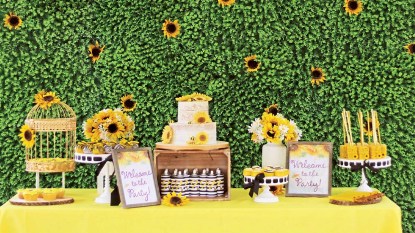 Sunflower Party lead tabletop with sunflower-kissed cakes and accents