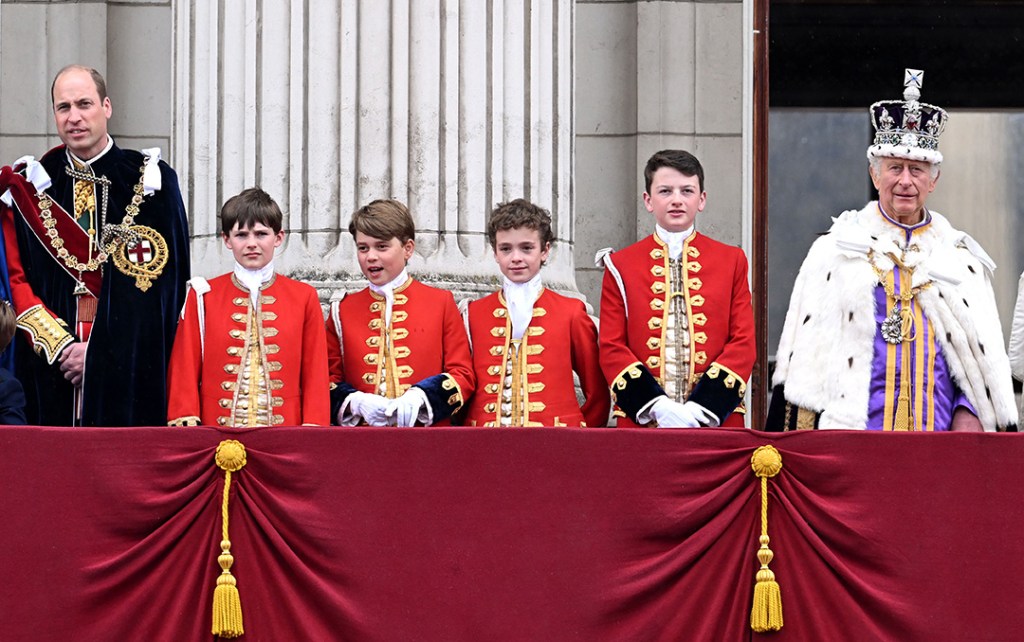 King Charles III, Prince William and Prince George on the balcony of Buckingham Palace at the Coronation of King Charles III, 2023