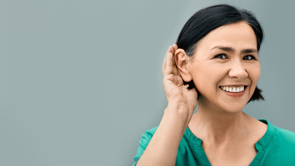 woman with hand to ear: how to improve hearing