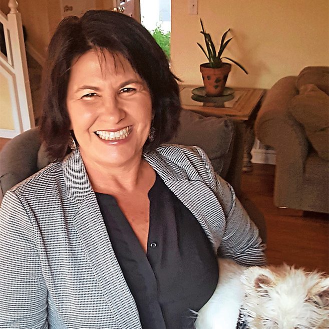 Lisa Jacobson with a dog as a side hustle dog sitting