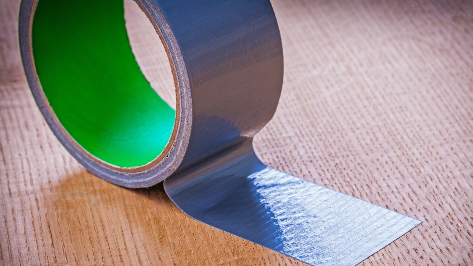 A roll of duct tape removing duct tape residue