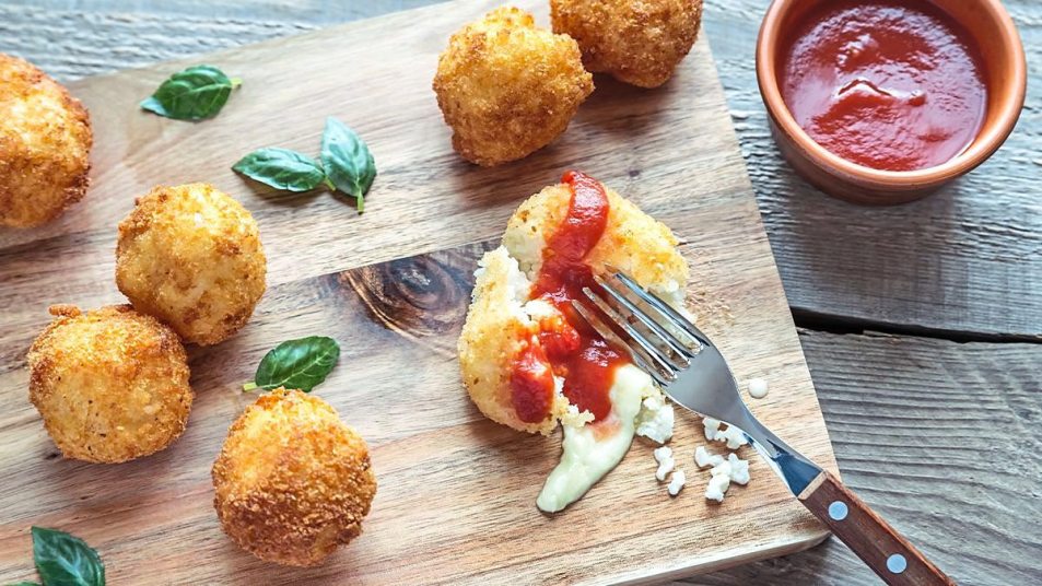 Cheesy Rice Balls sits waiting to be eaten (air fryer appetizers)