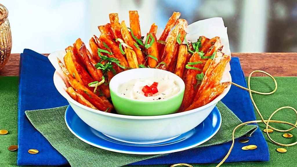 Sweet Potato “Fries” sits on a blue and green table (air fryer appetizers )