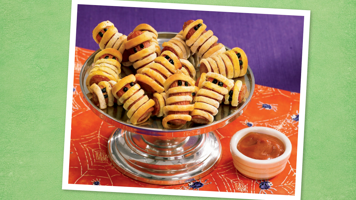 Hot Dog Mummies sits looking spooky (halloween dinner ideas)
