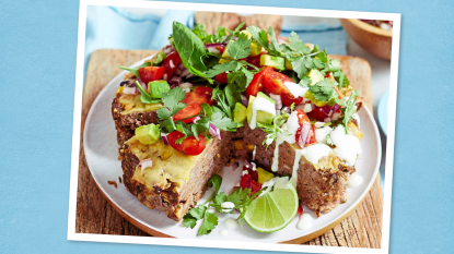 Fiesta Salad-Topped Meatloaf sits on a white plate (game day slow cooker recipes)