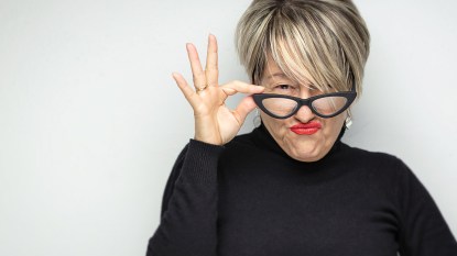 Woman going through menopause and clearly feeling irritability