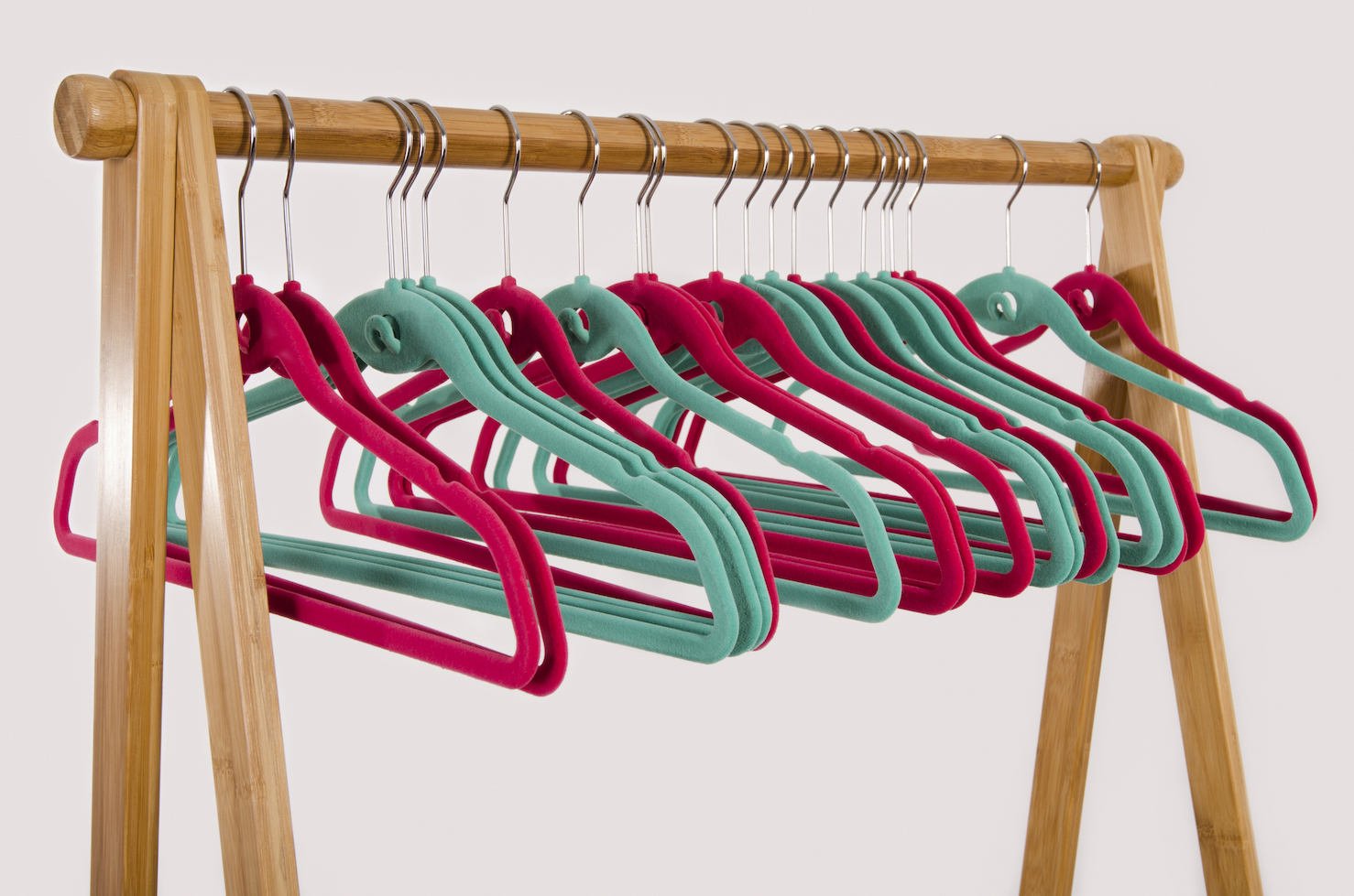 Clothes rack with thin velvet hangers for small closet storage ideas