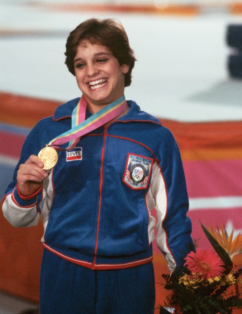 Mary Lou Retton with her gold medal in 1984