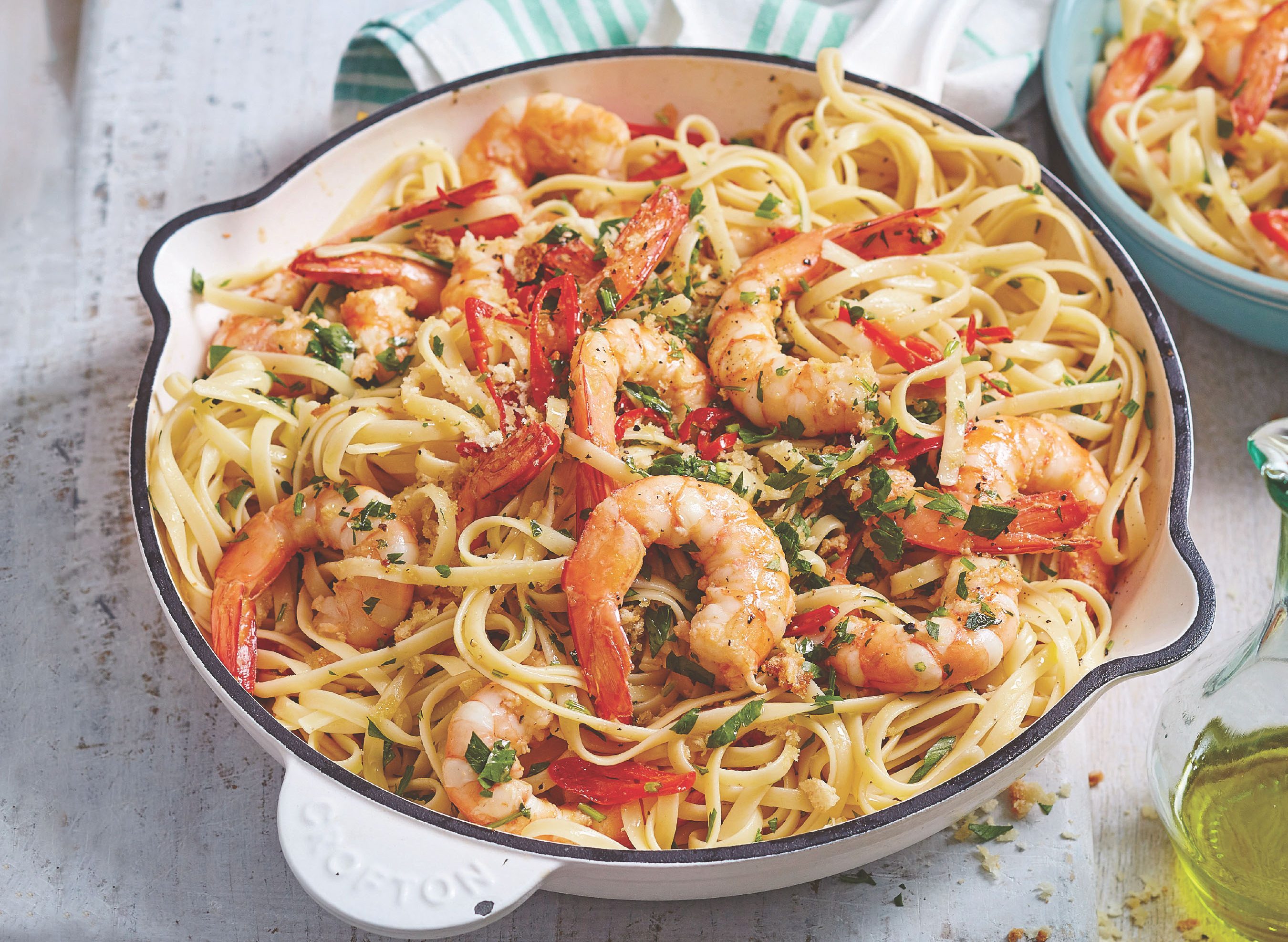 shrimp scampi linguine in pot on table