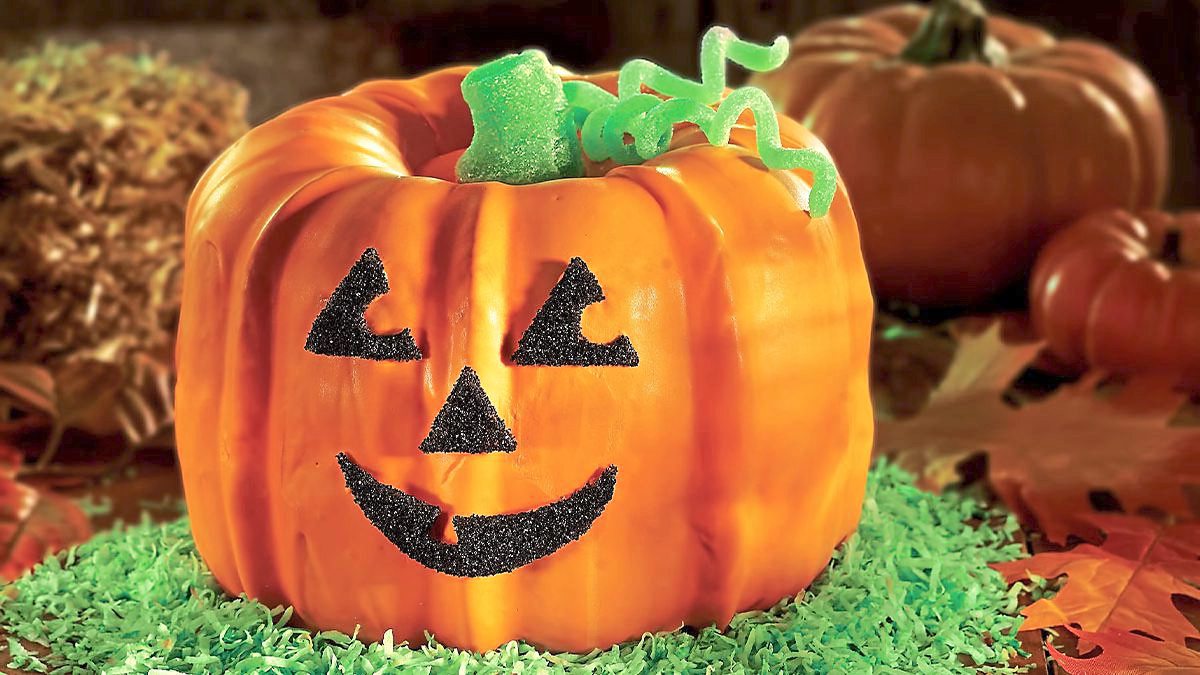 Pumpkin Cake sits on a plate (halloween cakes)