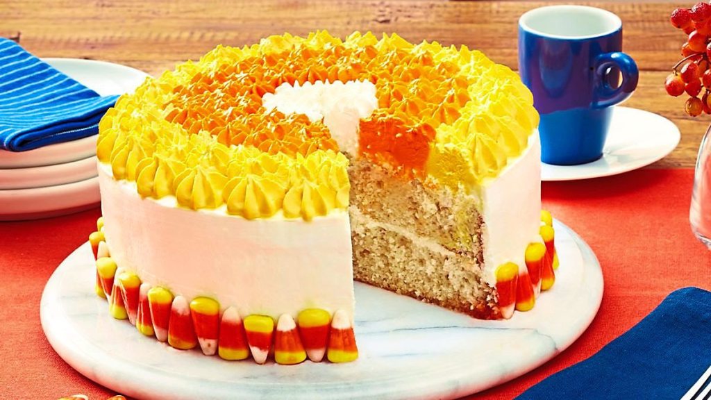 Candy Corn Cake sits on a marble plate (Halloween cakes)