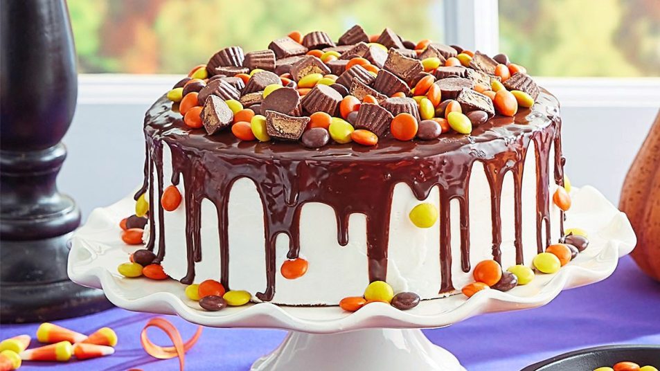 Reese’s Pieces Cake sits after reading halloween cakes
