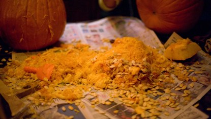 Messy Halloween pumpkin carving