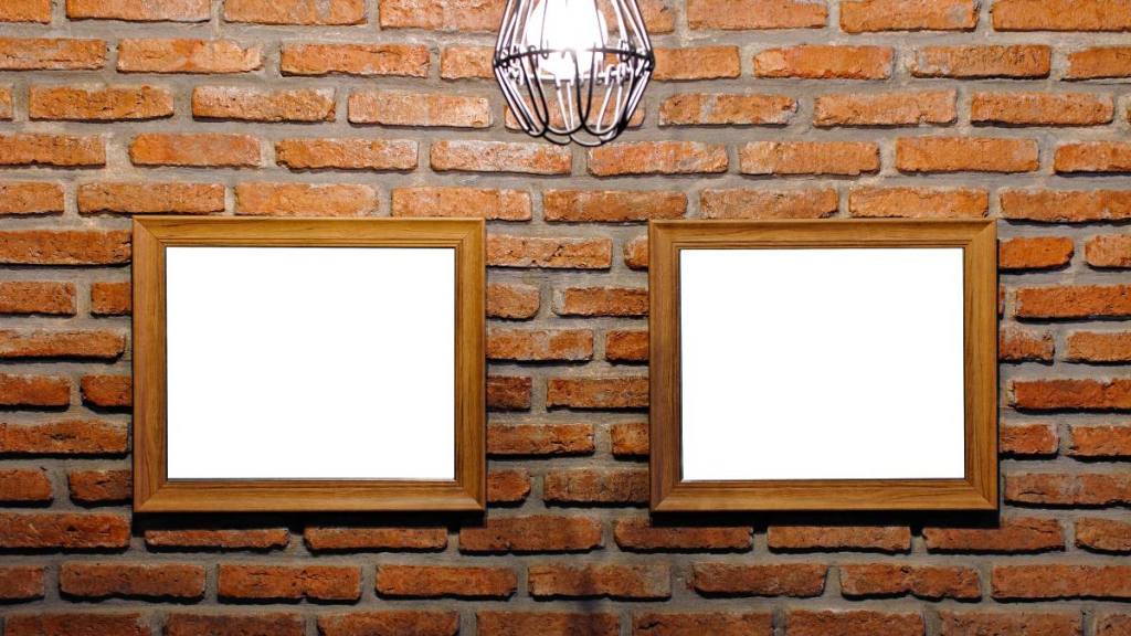 How to hang picture frames build : Wooden frame on brick wall