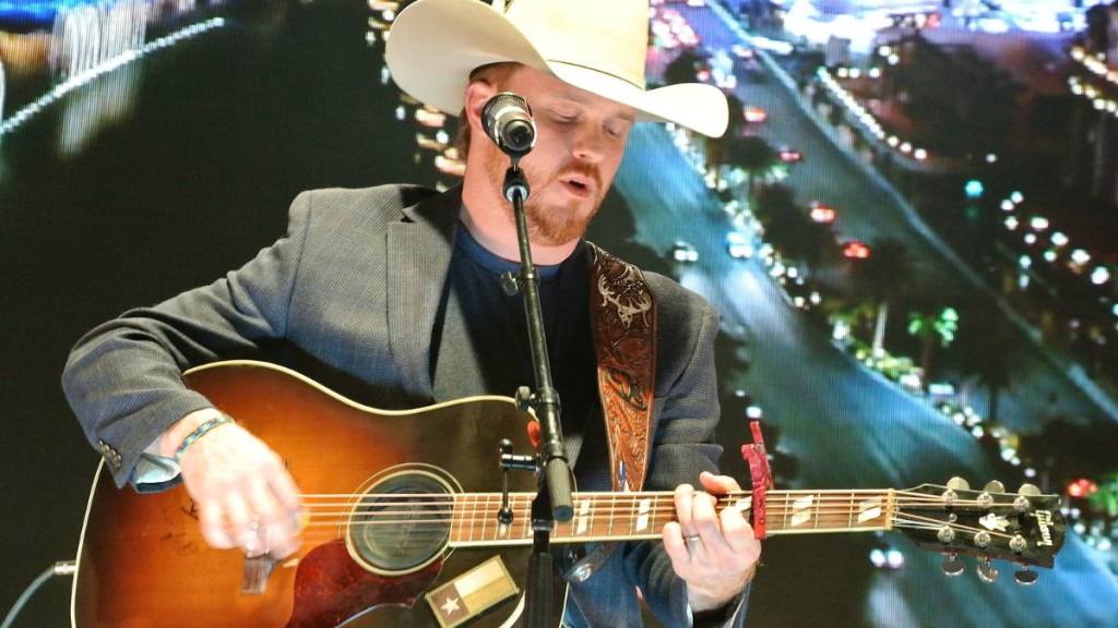 Singer/ songwriter Cody Johnson album performs during the "Outside the Barrel" with Flint Rasmussen show during the National Finals Rodeo's Cowboy Christmas at the Las Vegas Convention Center on December 13, 2017 in Las Vegas, Nevada.