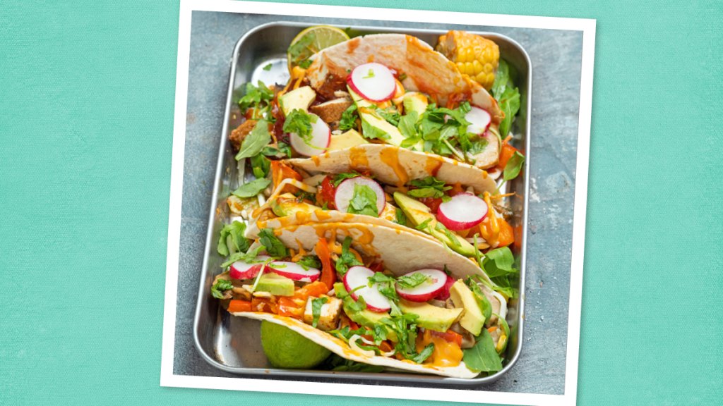 Mushroom-Tofu Tacos sits on a teal background (taco tuesday recipes)