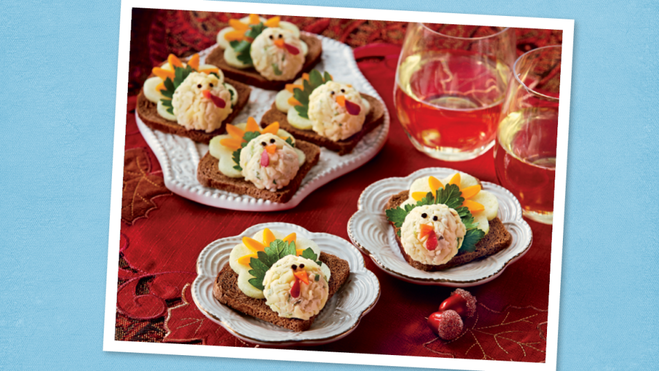 Turkey Cheese Ball Appetizers sits on a blue background (Thanksgiving appetizers)