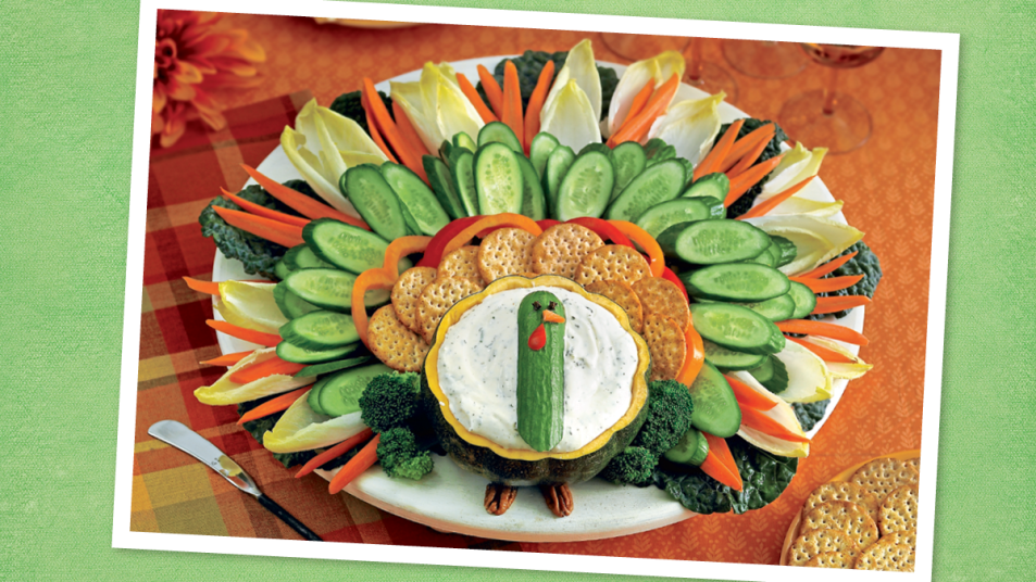 Turkey Crudités with Roasted Garlic Ranch Dip sits on green background (Thanksgiving appetizers)