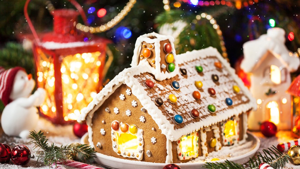 gingerbread house with "snow" made of powdered sugar: gingerbread house ideas