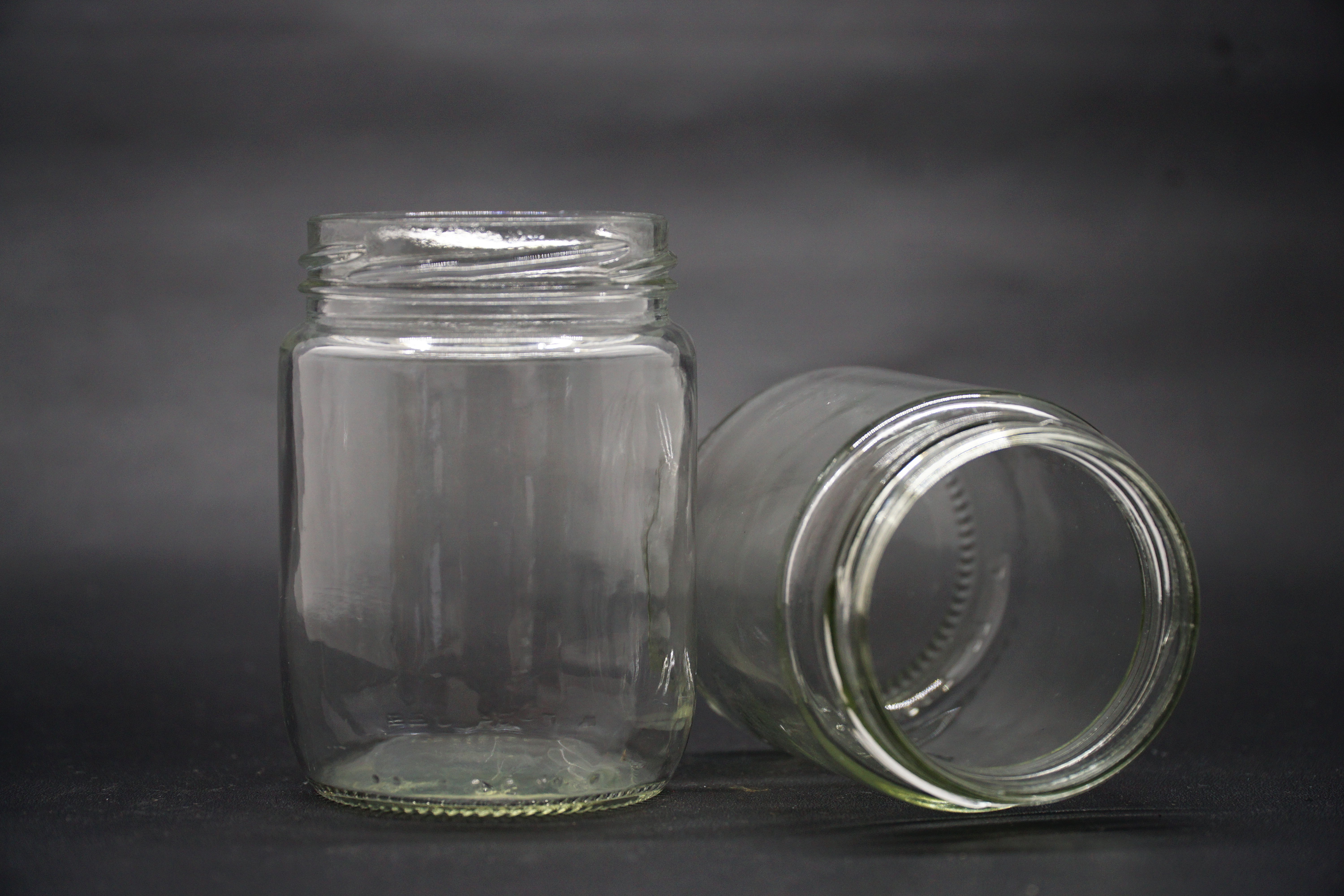 2 empty candle jars