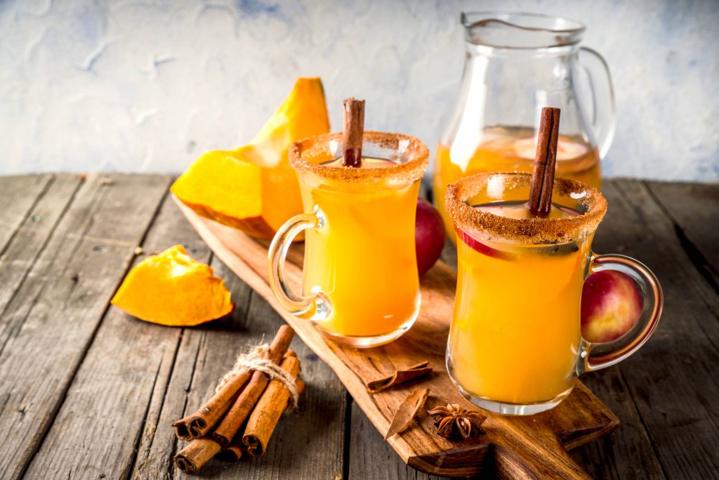 What to do with Thanksgiving leftovers: Apple Cider Signature cocktail on wooden tray