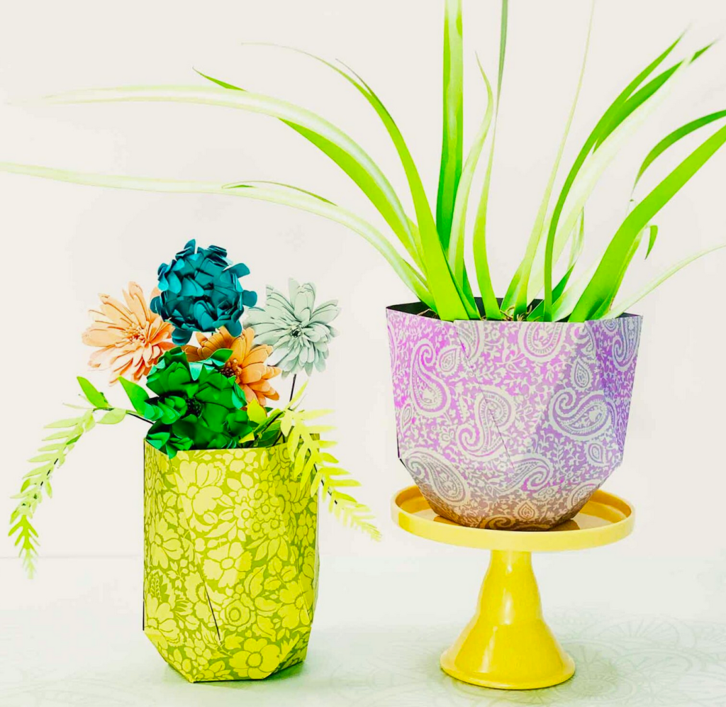 Stick-on wallpaper: Refresh a vase with floral print stick on paper; two vases with paper on them