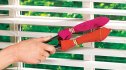 tongs covered in socks to clean blinds
