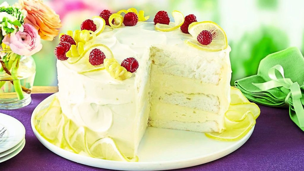 Lemon Angel Food Cloud Cake sits on a purple table (Easy desserts with few ingredients)