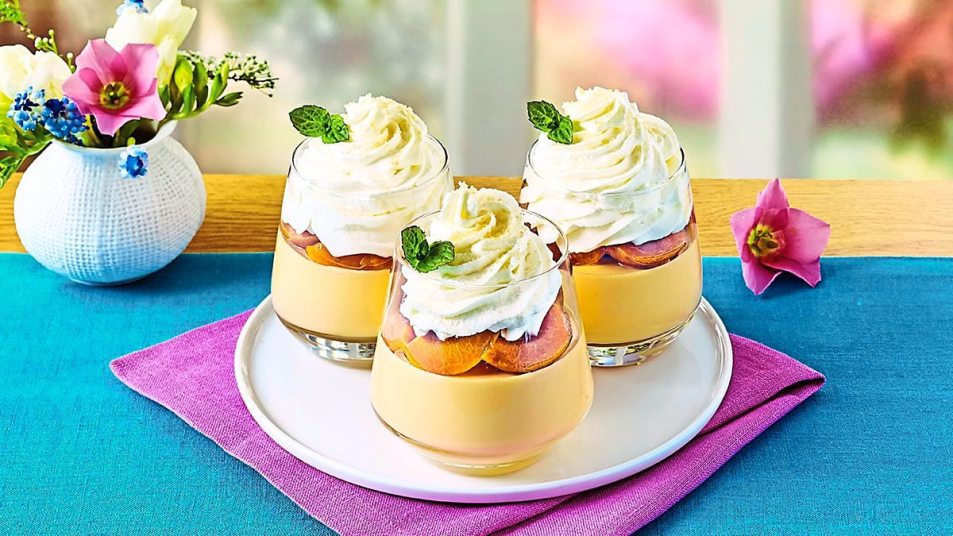 Caramelized Apricot Pudding Parfaits sits on a table (Easy desserts with few ingredients).