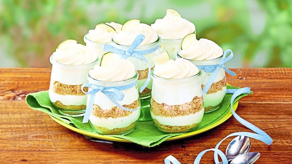 Key Lime Cheesecake Parfaits sits on a green plate (Easy desserts with few ingredients)