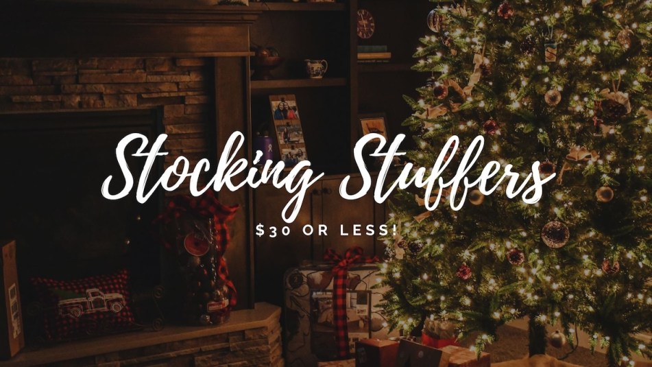 A stock Canva image of a Christmas tree and hearth with text that reads: 'Stocking Stuffers $30 or less!'
