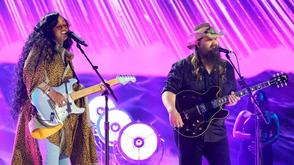 H.E.R. and Chris Stapleton perform onstage for the 2021 CMT Music Awards