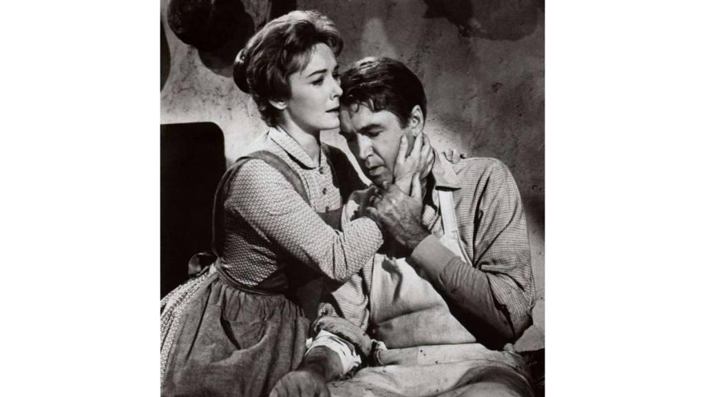 Jimmy Stewart Movies: Vera Miles and Jimmy Stewart holding each other in “The Man Who Shot Liberty Valance”