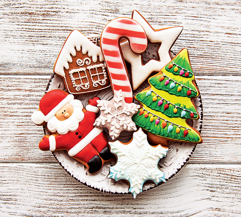 Holiday party: Cookie platter holiday and Christmas cookies on round plate on tabletop