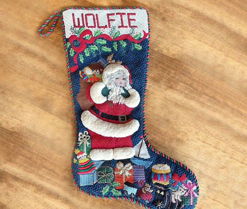 The stocking Valerie needlepointed for Wolfie when he was 5 years old
