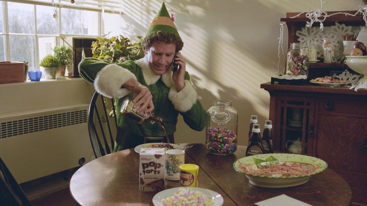 Will Ferrell pours syrup on spaghetti in Elf, 2003
