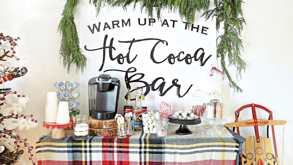 Hot chocolate bar: lead hot cocoa station bar with plaid tablecloth and help-yourself hot cocoa and cups