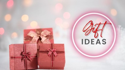 An image of presents with a glowing background next to text that reads 'Gift Ideas.'