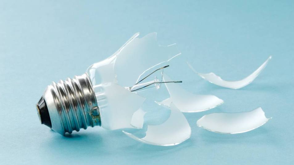 how to remove a broken lightbulb: Broken light bulb, close-up