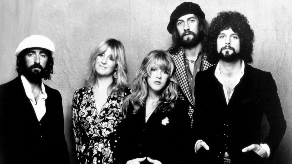 Group of people pose for a photo ; Fleetwood Mac Rumours lead